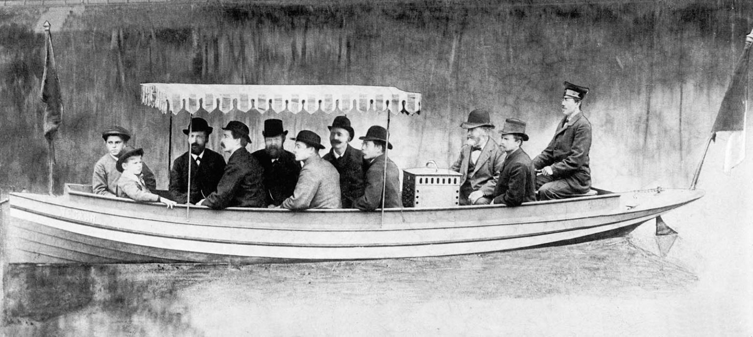 Wilhelm Maybach on a trip aboard the motorboat driven by a Daimler engine on the River Neckar near Cannstatt in 1886