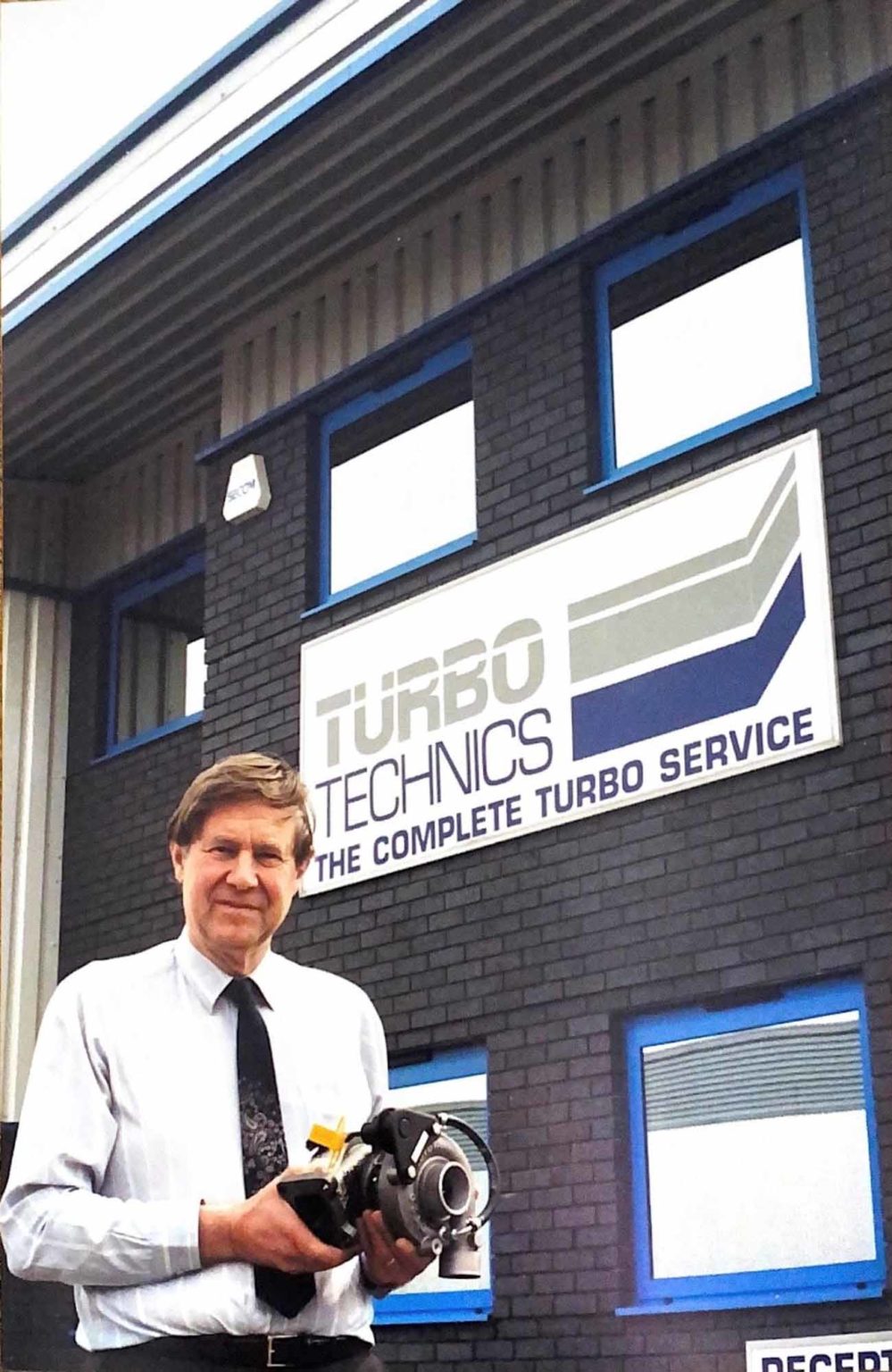 Turbo Technics Geoff Kershaw outside new facilities in early 90s